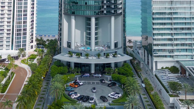 bird's eye view with a view of the beach and a water view