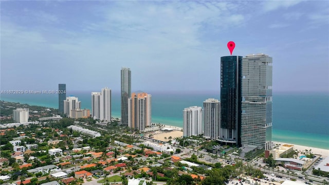 view of city featuring a view of the beach and a water view