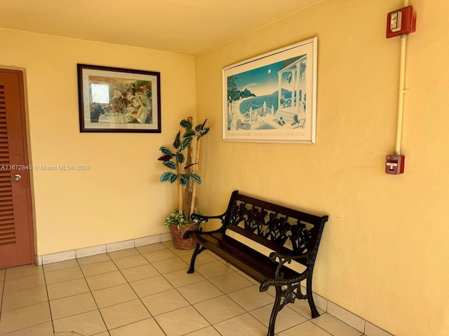 sitting room with light tile patterned floors