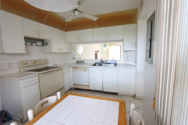 10360 NW 30th Ct Unit 204, Sunrise, FL 33322 - kitchen with white appliances, light countertops, ceiling fan, white cabinetry, and light tile patterned floors