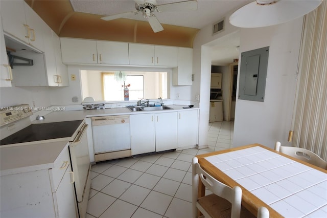 10360 NW 30th Ct Unit 204, Sunrise, FL 33322 - kitchen featuring electric panel, white appliances, ceiling fan, light tile patterned floors, and white cabinetry