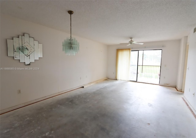10360 NW 30th Ct Unit 204, Sunrise, FL 33322 - empty room with unfinished concrete floors, a ceiling fan, a chandelier, and a textured ceiling