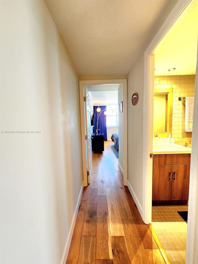 hall featuring light wood-type flooring