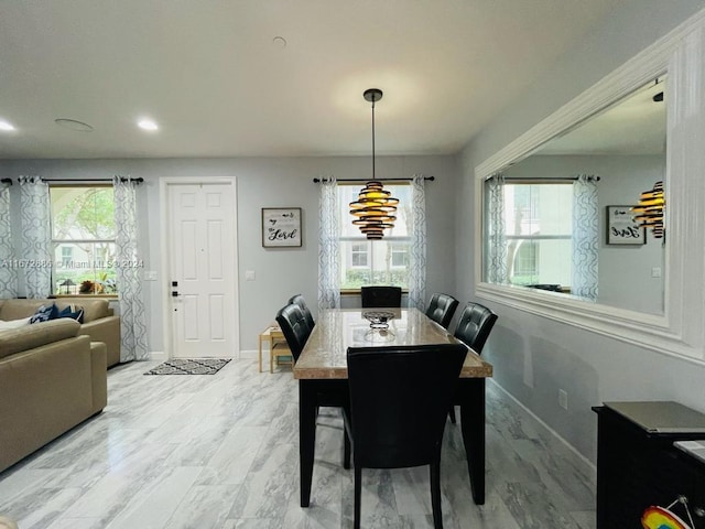 dining area with plenty of natural light