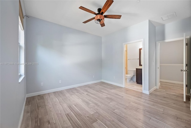 4184 Cascada Cir, Cooper City, FL 33024 - unfurnished bedroom with ensuite bathroom, ceiling fan, visible vents, baseboards, and light wood-type flooring