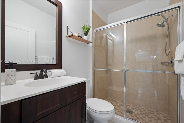 4184 Cascada Cir, Cooper City, FL 33024 - bathroom featuring a stall shower, vanity, and toilet