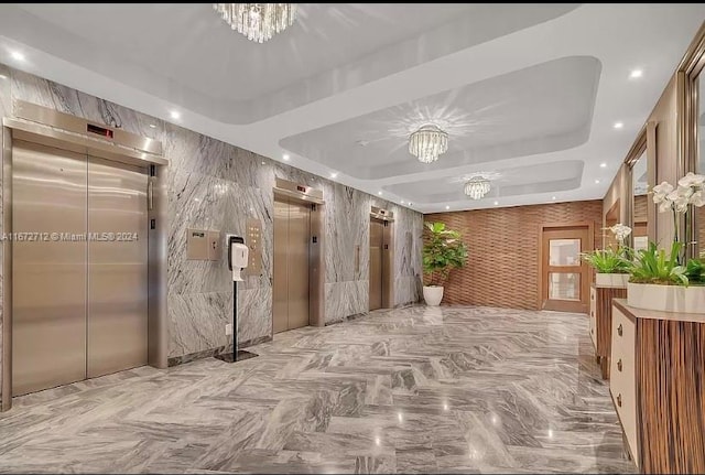 reception area with a notable chandelier