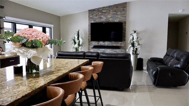 tiled living room featuring lofted ceiling