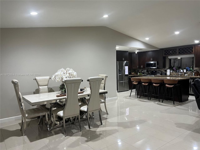 20461 SW 320th St, Homestead, FL 33030 - dining space with vaulted ceiling, recessed lighting, and bar area