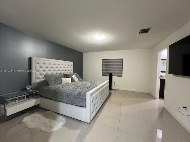 20461 SW 320th St, Homestead, FL 33030 - bedroom featuring baseboards and light tile patterned floors