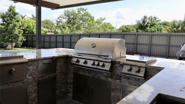 20461 SW 320th St, Homestead, FL 33030 - view of patio / terrace featuring an outdoor kitchen