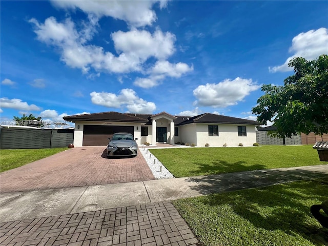 20461 SW 320th St, Homestead, FL 33030 - ranch-style house with decorative driveway, an attached garage, and stucco siding