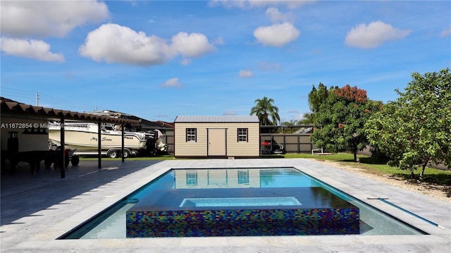 view of pool featuring a shed