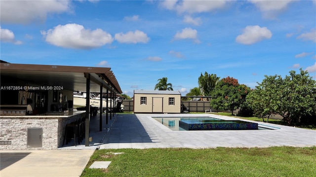 20461 SW 320th St, Homestead, FL 33030 - view of pool featuring area for grilling, a patio, a fenced backyard, a storage unit, and a jacuzzi