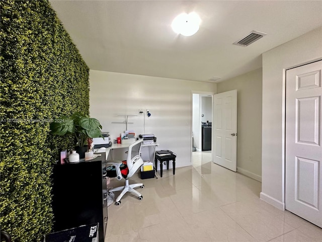 office with light tile patterned flooring