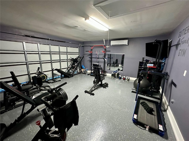 gym featuring a wall mounted air conditioner