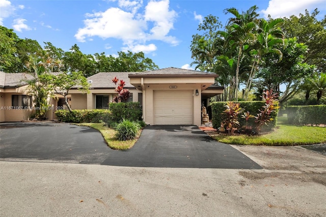 view of front of home with a garage