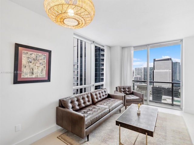 living room featuring floor to ceiling windows