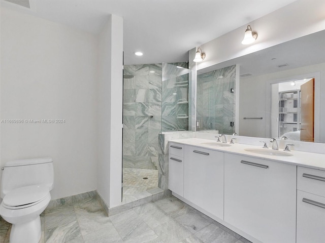 bathroom featuring walk in shower, vanity, and toilet