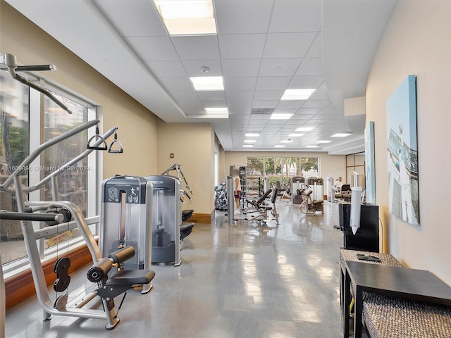 exercise room with a drop ceiling