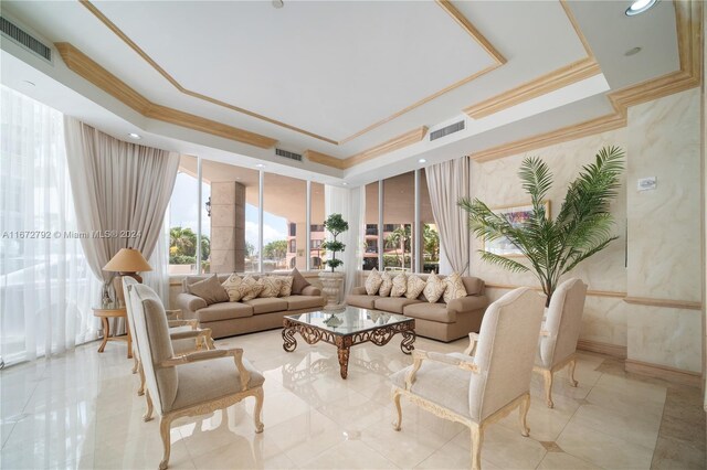 8855 Collins Ave Unit 2D, Surfside, FL 33154 - living room with a raised ceiling and ornamental molding