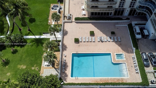 8855 Collins Ave Unit 2D, Surfside, FL 33154 - view from above of property featuring a pool area