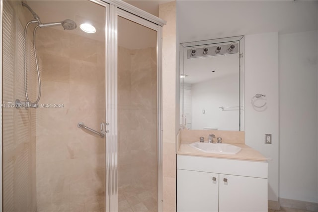 8855 Collins Ave Unit 2D, Surfside, FL 33154 - bathroom featuring a shower stall and vanity