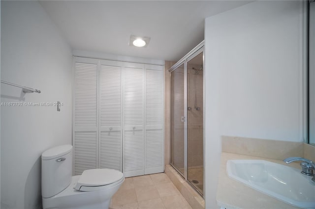 8855 Collins Ave Unit 2D, Surfside, FL 33154 - full bath featuring a closet, a sink, a stall shower, and toilet
