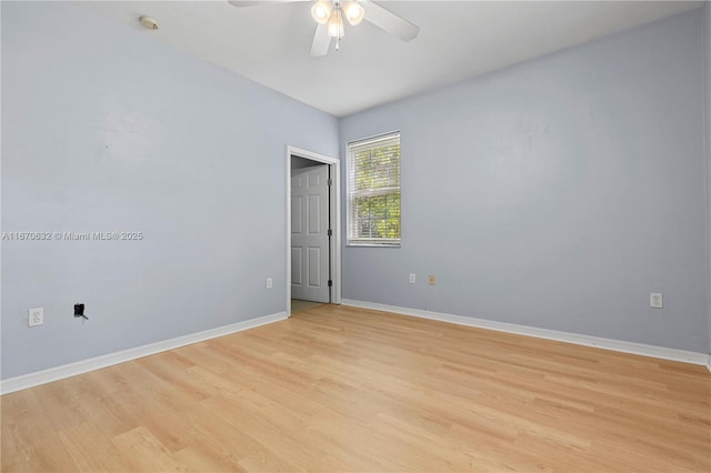 empty room with ceiling fan and light wood-type flooring