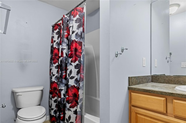 full bathroom with vanity, shower / bath combination with curtain, and toilet