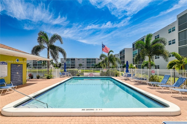 view of swimming pool featuring a patio