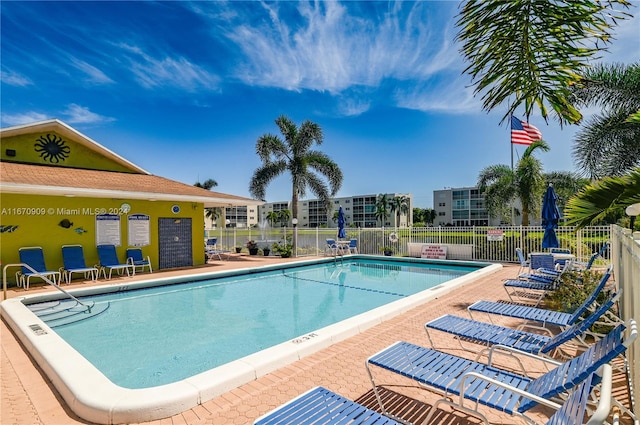 view of swimming pool featuring a patio