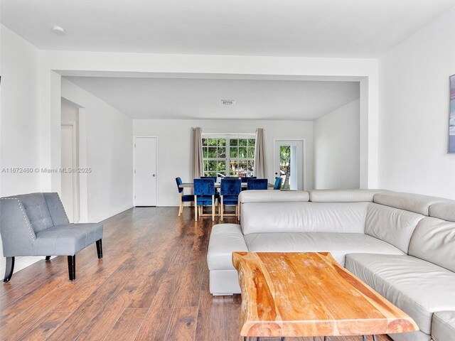 living room featuring dark hardwood / wood-style floors