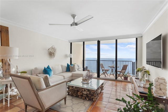 tiled living room with a wall of windows, a water view, ornamental molding, and ceiling fan