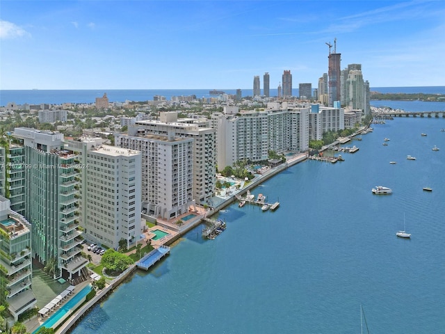 birds eye view of property featuring a water view