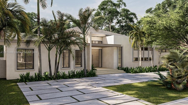 view of front of house with a front lawn