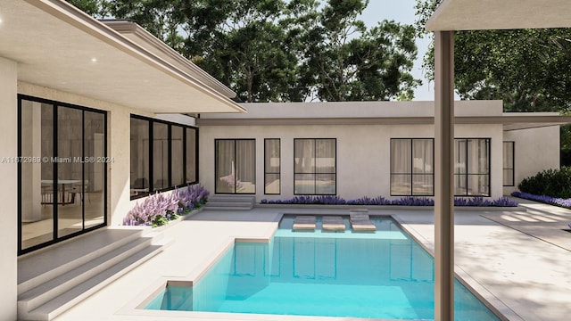 view of swimming pool featuring a patio area