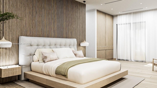 bedroom featuring light hardwood / wood-style floors