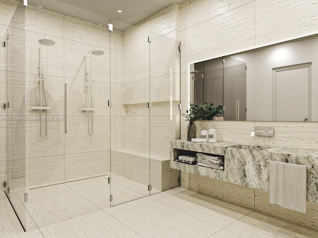 bathroom with walk in shower and tile patterned flooring