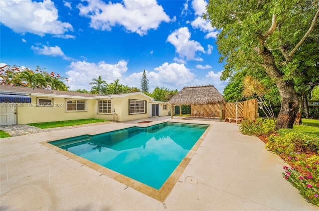 view of swimming pool featuring a patio area