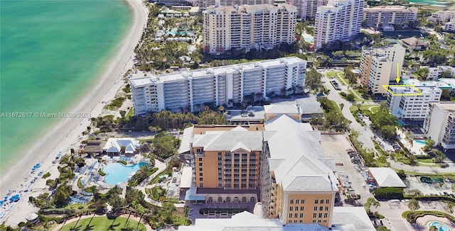 aerial view with a view of the beach and a water view