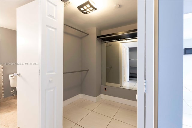 bathroom with tile patterned flooring