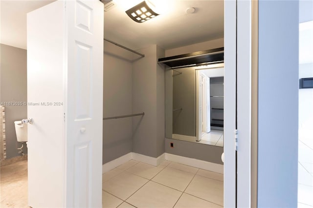 3300 NE 192nd St Unit 1108, Aventura, FL 33180 - bathroom with tile patterned flooring and baseboards