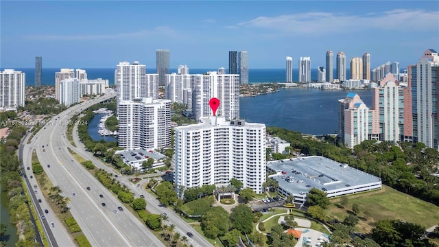 3300 NE 192nd St Unit 1108, Aventura, FL 33180 - drone / aerial view of a main thoroughfare, a nearby body of water, and a view of skyline