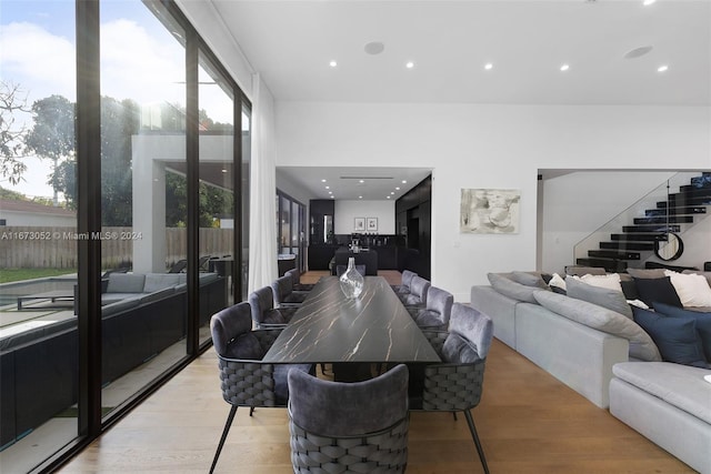 dining area featuring light wood-type flooring