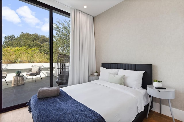 bedroom with wood-type flooring