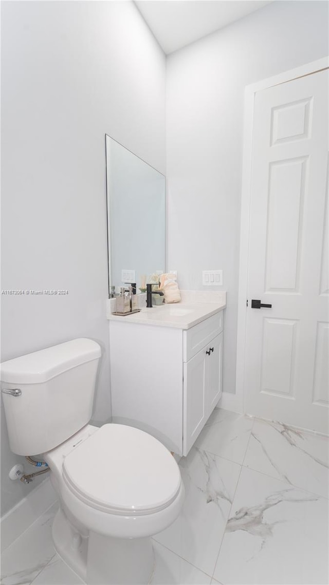 932 Maddock St, Lehigh Acres, FL 33974 - half bath with marble finish flooring and vanity