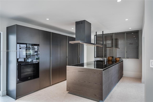 kitchen featuring light carpet and island range hood