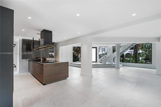 kitchen featuring island range hood