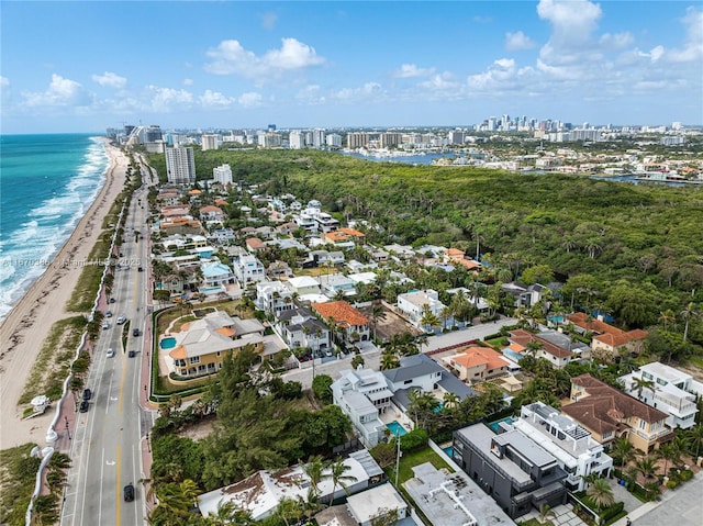 drone / aerial view with a view of the beach and a water view